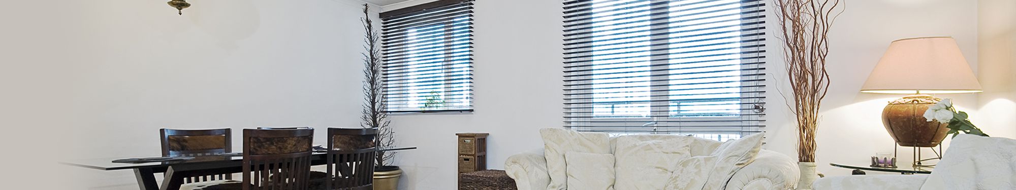 custom blinds in a living & dining area