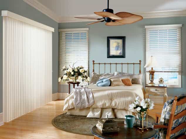 Professionally installed window blinds on bedroom windows