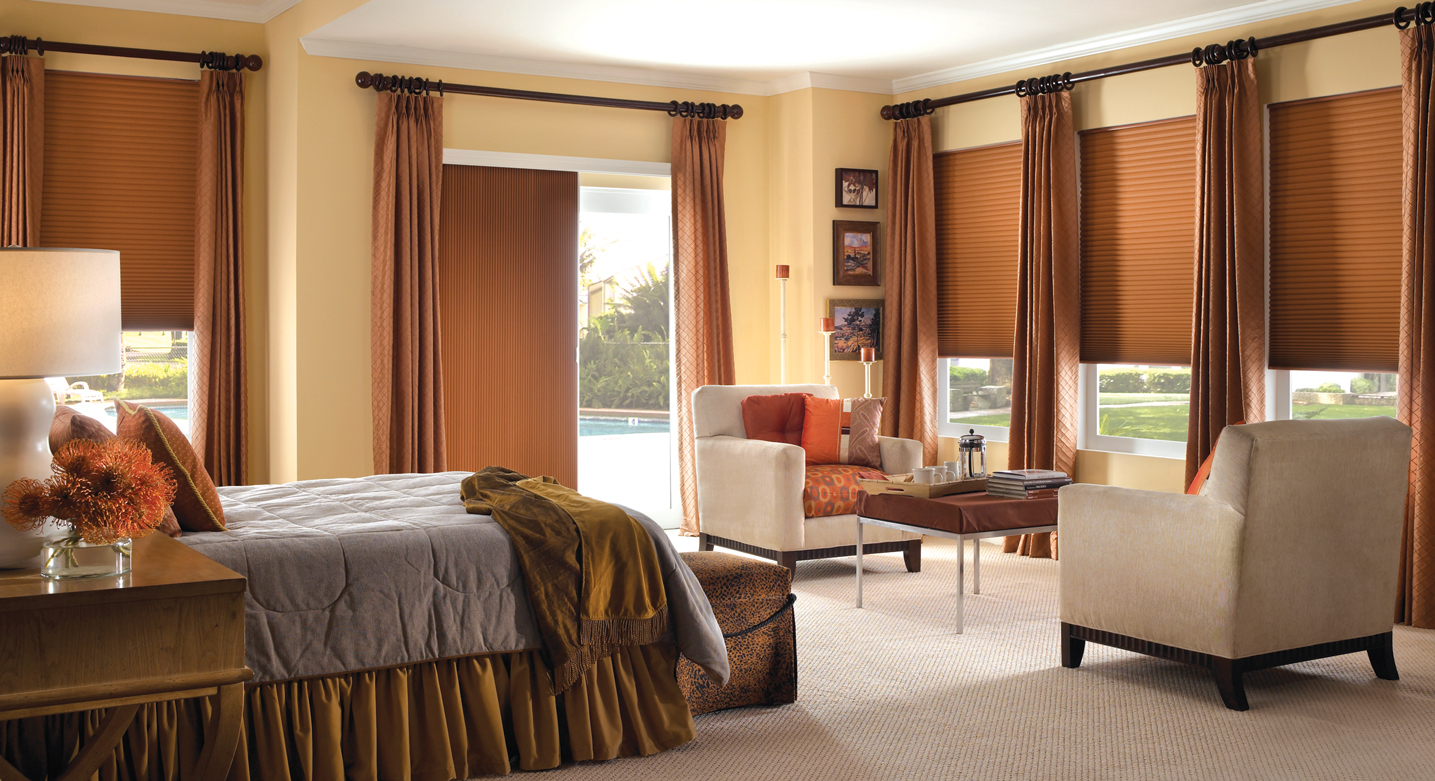 room with cellular shades and curtains
