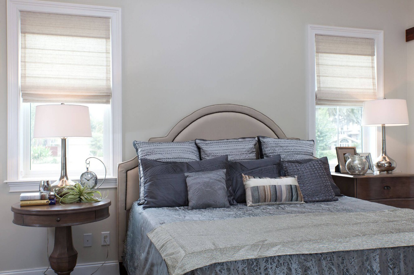 bedroom with roman shades